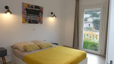 Un ou plusieurs lits dans un hébergement de l'établissement Bas de villa prestations haut de gamme