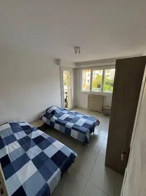 Un ou plusieurs lits dans un hébergement de l'établissement Appartement T3 Cagnes sur Mer