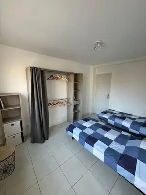 Un ou plusieurs lits dans un hébergement de l'établissement Appartement T3 Cagnes sur Mer