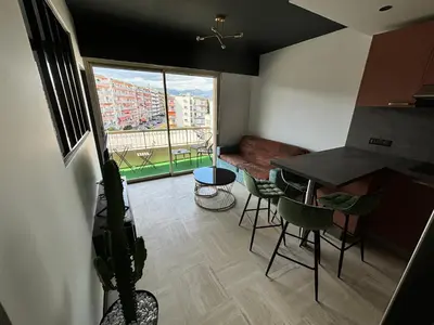 Coin salon dans l'établissement Cosy 2p
