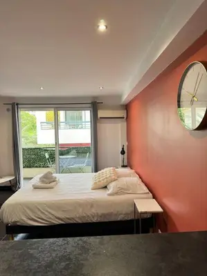 Un ou plusieurs lits dans un hébergement de l'établissement Grand Studio Centre Cannes
