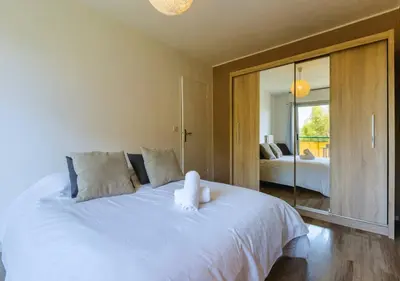 Un ou plusieurs lits dans un hébergement de l'établissement Appart 2 ch Vue Mer & Montagne, Terrasse, Parking