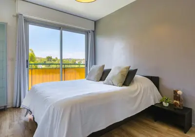 Un ou plusieurs lits dans un hébergement de l'établissement Appart 2 ch Vue Mer & Montagne, Terrasse, Parking