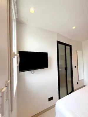 Télévision ou salle de divertissement dans l'établissement Appartement 4 pièces luxueux
