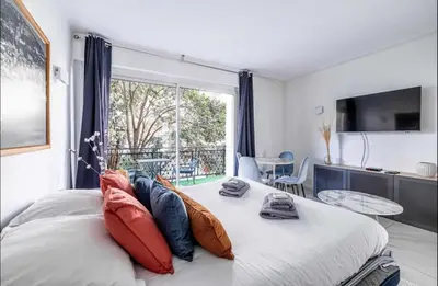 Un ou plusieurs lits dans un hébergement de l'établissement Appartement disign CLUB B
