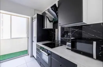 Cuisine ou kitchenette dans l'établissement Appartement disign CLUB B