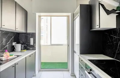Cuisine ou kitchenette dans l'établissement Appartement disign CLUB B