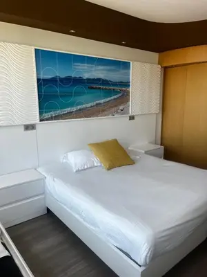 Un ou plusieurs lits dans un hébergement de l'établissement SoBlue Hôtel