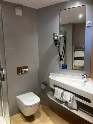 Salle de bains dans l'établissement SoBlue Hôtel
