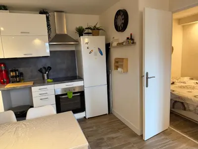 Cuisine ou kitchenette dans l'établissement Dernier étage avec garage, piscines et tennis