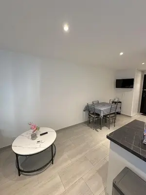Télévision ou salle de divertissement dans l'établissement Residence Graziella Appartement 100