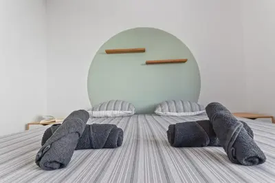 Un ou plusieurs lits dans un hébergement de l'établissement Le Cosy - Spacieux - Clim - WIFI - Hippodrome - Hypercentre