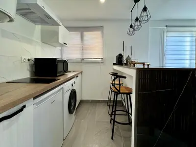 Cuisine ou kitchenette dans l'établissement Studio de 30m2 - À 5min du centre