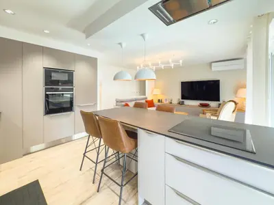 Cuisine ou kitchenette dans l'établissement Le Marcellin by Winsome Destination