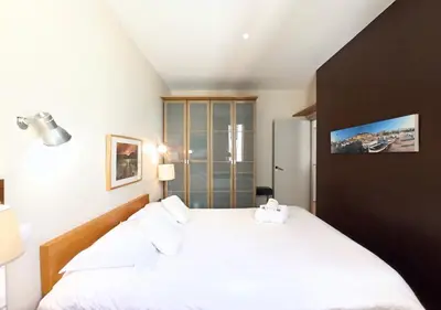 Un ou plusieurs lits dans un hébergement de l'établissement Viva Riviera - 10 Rue Florian