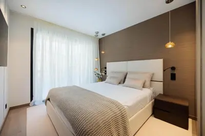 Un ou plusieurs lits dans un hébergement de l'établissement 1973 - Luxurious waterfront apartment Croisette