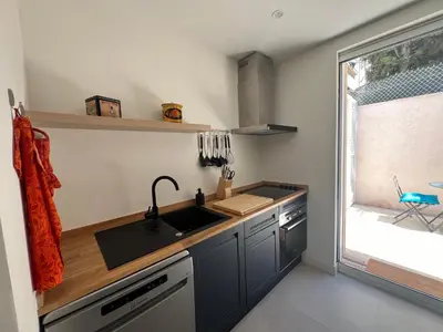 Cuisine ou kitchenette dans l'établissement Splendide maison Solstice