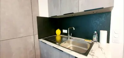 Cuisine ou kitchenette dans l'établissement O'Cap