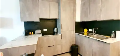 Cuisine ou kitchenette dans l'établissement O'Cap