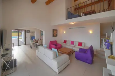 Coin salon dans l'établissement Upstays Sea View Pool 200m² Villa