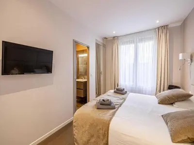 Un ou plusieurs lits dans un hébergement de l'établissement Appt Exclusif - 4BR 8P- Parking - Croisette
