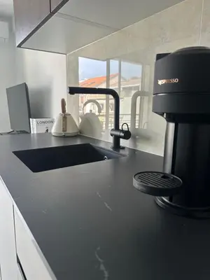 Cuisine ou kitchenette dans l'établissement Suite le Venitia - Appartement standing