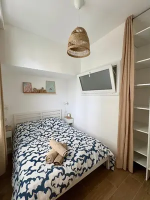 Un ou plusieurs lits dans un hébergement de l'établissement App neuf 1 chambre près du centre et plages