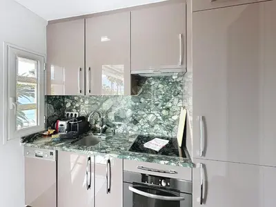 Cuisine ou kitchenette dans l'établissement One bedroom apartment on La Croisette - Sea view