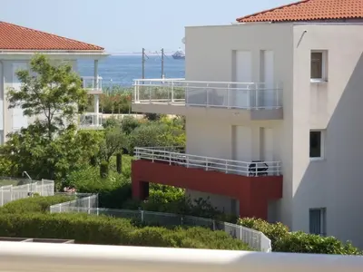 Balcon ou terrasse dans l'établissement Appartement Les Alizés