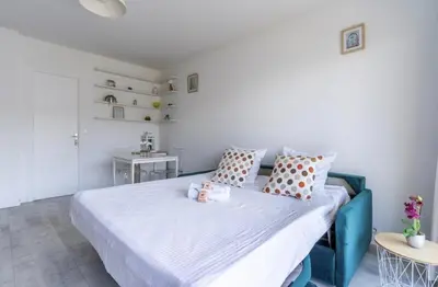 Un ou plusieurs lits dans un hébergement de l'établissement Grand studio vue mer à Antibes