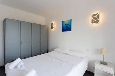 Un ou plusieurs lits dans un hébergement de l'établissement LES ANGES -F2 Appartement, terrasse vue mer, piscine, wifi