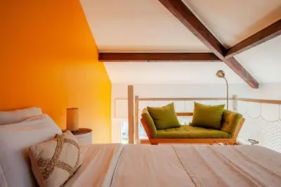 Un ou plusieurs lits dans un hébergement de l'établissement Sunny duplex close to Croisette, free parking