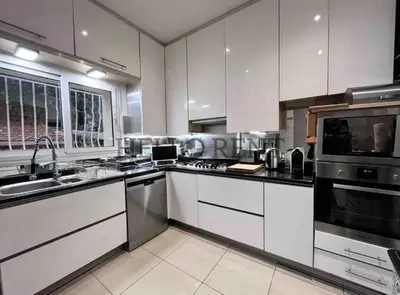 Cuisine ou kitchenette dans l'établissement Grande Villa Cannes Centre havre de paix