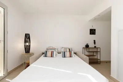 Un ou plusieurs lits dans un hébergement de l'établissement CALYPSO- Superbe perle, Vieil Antibes, wifi, climatisation