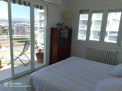 Un ou plusieurs lits dans un hébergement de l'établissement Bel appartement face mer