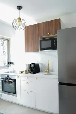 Cuisine ou kitchenette dans l'établissement Appartement Cosy, Calme et Climatisé proche centre