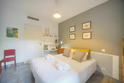 Un ou plusieurs lits dans un hébergement de l'établissement FRGK 'Diane Elegance and Comfort in Antibes'