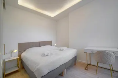 Un ou plusieurs lits dans un hébergement de l'établissement Luxueux 3 chambres BALCON, CARRE D'OR- COEUR DE CANNES A3B129