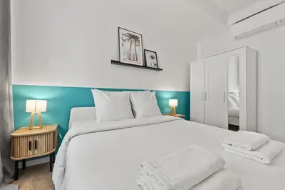 Un ou plusieurs lits dans un hébergement de l'établissement Beautiful and Cozy 3 bedrooms in Antibes