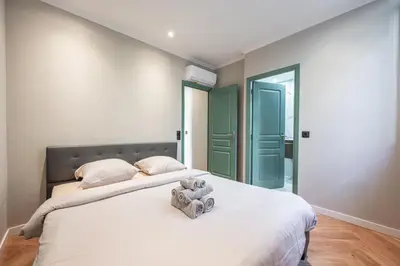 Un ou plusieurs lits dans un hébergement de l'établissement Bel appartement centre Cannes 1min de la Croisette