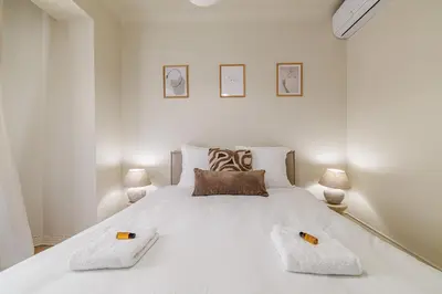 Un ou plusieurs lits dans un hébergement de l'établissement Cannes banana apartment