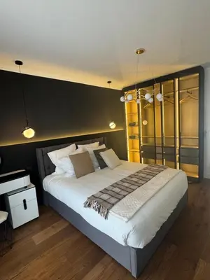 Un ou plusieurs lits dans un hébergement de l'établissement Appartement Moderne à Cannes