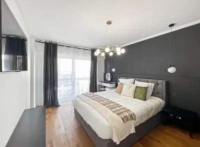 Un ou plusieurs lits dans un hébergement de l'établissement Appartement Moderne à Cannes