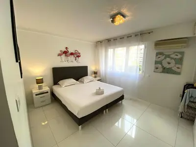 Un ou plusieurs lits dans un hébergement de l'établissement Spacieux 3 chambres BALCON, MARTINEZ -CARLTON A3B130