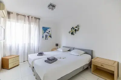 Un ou plusieurs lits dans un hébergement de l'établissement Spacieux 3 chambres BALCON, MARTINEZ -CARLTON A3B130