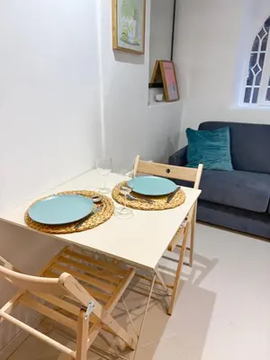 Coin salon dans l'établissement NEW - Studio Vieil Antibes - Les Remparts