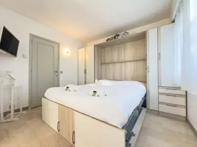 Un ou plusieurs lits dans un hébergement de l'établissement Le Cozy by Winsome Destination