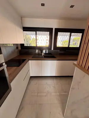 Cuisine ou kitchenette dans l'établissement Vue mer exceptionnelle plage parking