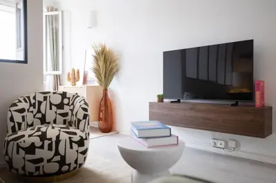 Télévision ou salle de divertissement dans l'établissement Appartement à Cannes