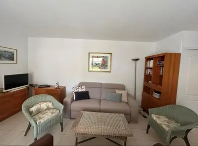 Coin salon dans l'établissement Appartement Hauts de Vaugrenier